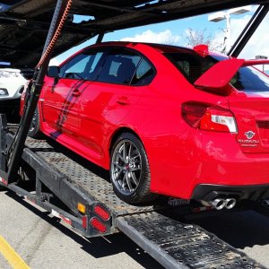 Red STI off truck