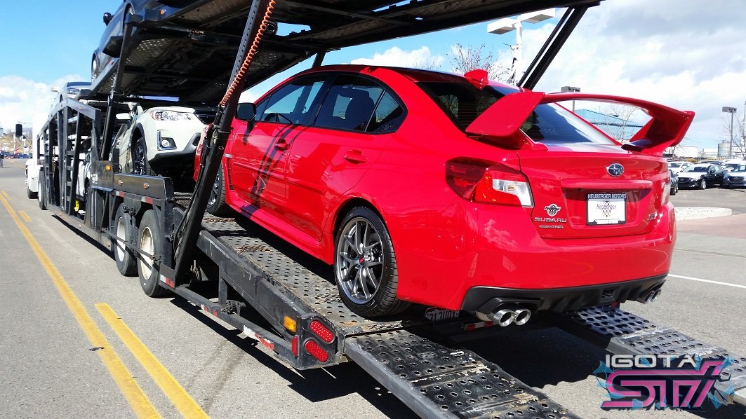 Red STI off truck